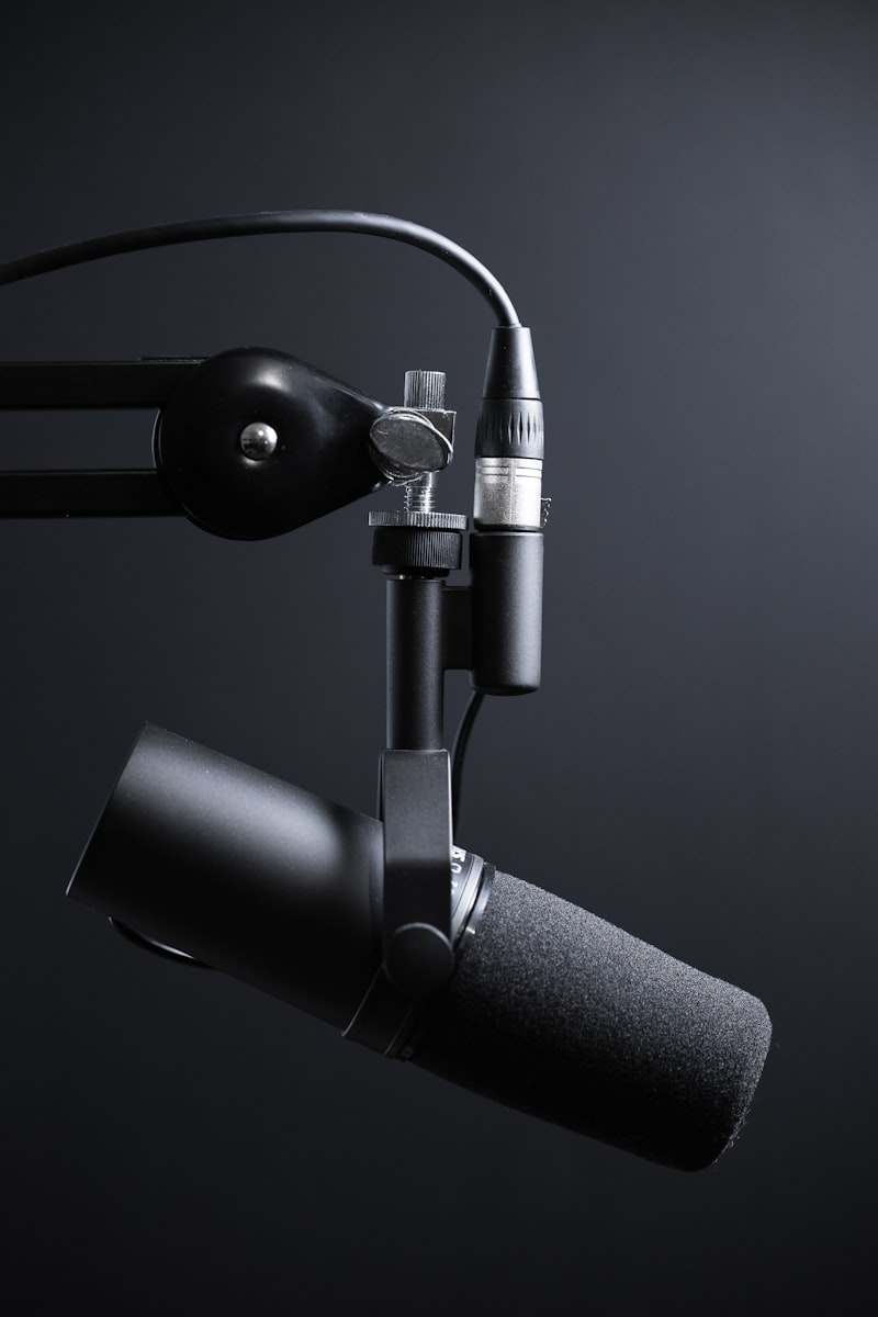Setting up a microphone and neat ring light for an educational audio and video podcast session
